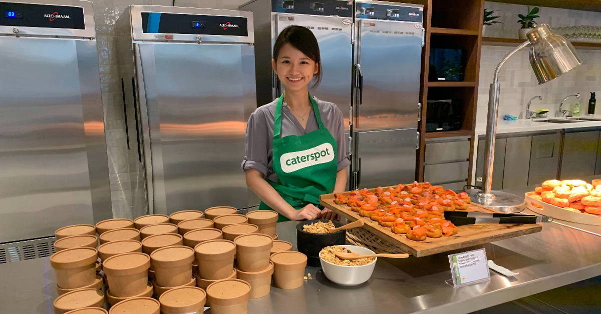 CaterSpots On-Site Coordinator ready to serve lunch in the office